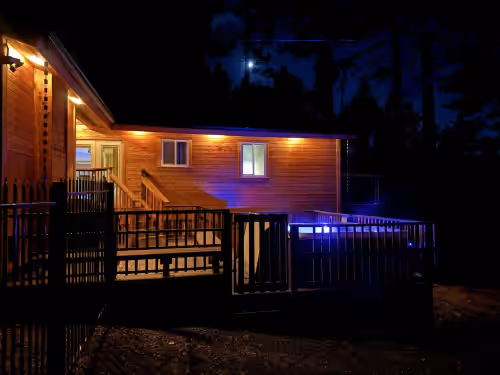 Back Deck in the Evening at Remodeled Hot Tub Home Near Heavenly Village, Chairlift and Lake-Sleeps 9 Max