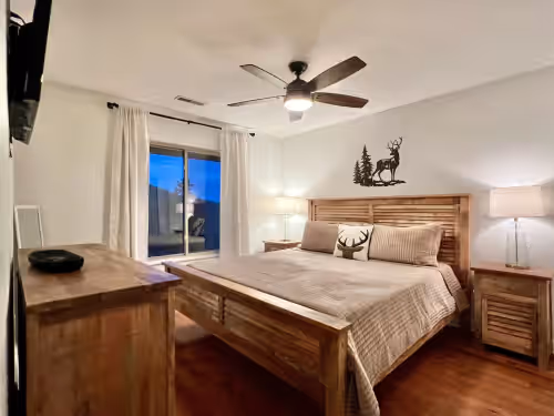 Bedroom 3 with King size bed (main level) at 7 Bedroom w/ Heated Pool Overlooking Pigeon Forge