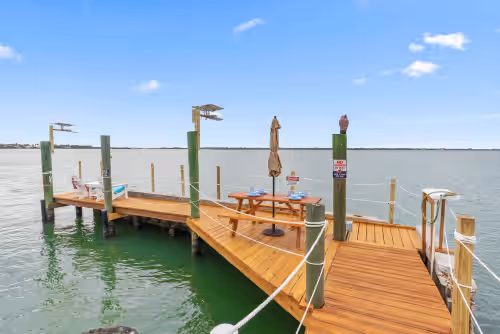 Aquarius South private dock w/ electric & water service at Aquarius Resort: 2 Side-by-side beach houses! 2 pools, 2 spas, 2