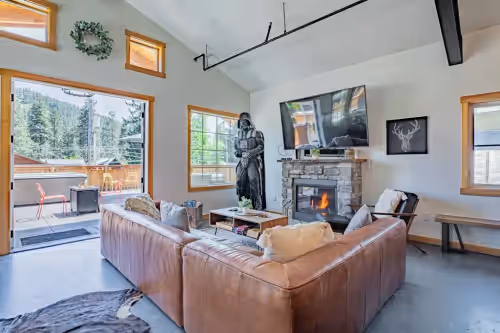 Living area at Welcome To Your Perfect Group Retreat! Sleeps up to 26 Hot Tub Pets Welcome