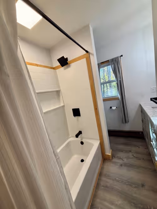 Tub view. at Beautiful 12 Bdrm Rustic Chalets Built For Large Group Entertaining w/ Privacy