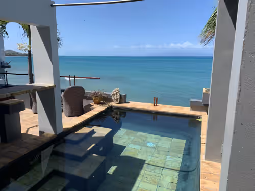 Stunning waterfront, art deco family compound cascading to the water’s edge