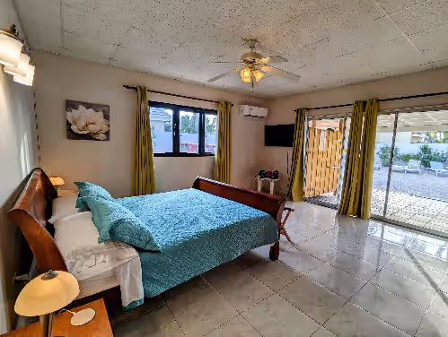 Master bedroom #1 has attached bath and TV for streaming. at Huge Villa! Walk to Beach, Casinos, and Restaurants. Private