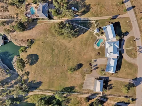 We have 11 bedrooms across five separate living areas at 11 Bedroom Lake Travis Estate w/ Dock+Pool+Hot Tub