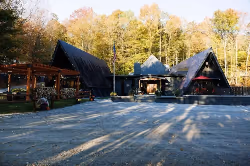 View of the front of the property. at Rent An Inn! Takeover the Birch Ridge Mountain Lodge: 11 Rooms, Bar, Fireplace. 28