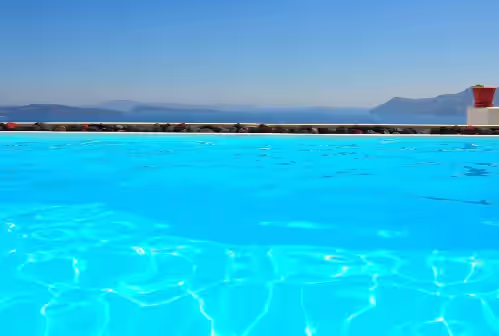 Caldera view while swimming in the pool. at Grand Canava