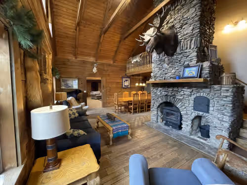 Living area at Quality Time Together! Log Cabin Sleeps 28 Kids Love It