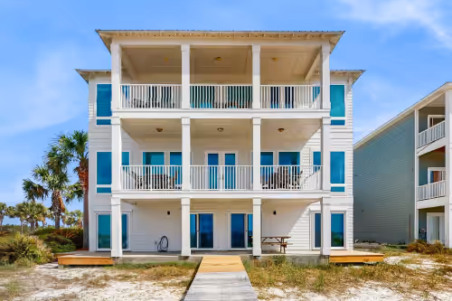 Spacious beachfront wedding-friendly home with multiple decks & shared pool