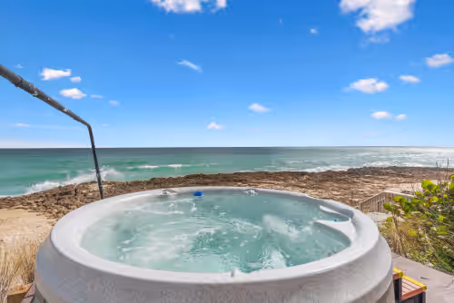 Oceanfront hot tub (always cleaned, refilled, heated & ready for you at check-in at Twin Beaches: 2 houses ON the ocean/ON