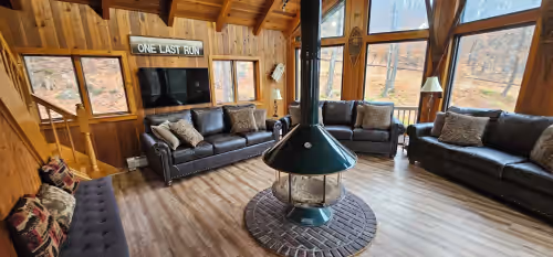 Third floor fireplace room overlooking the Sachem Trail at Ski In/Out Luxury 8BR Okemo Chalet on Sachem Trail Sleeps 22
