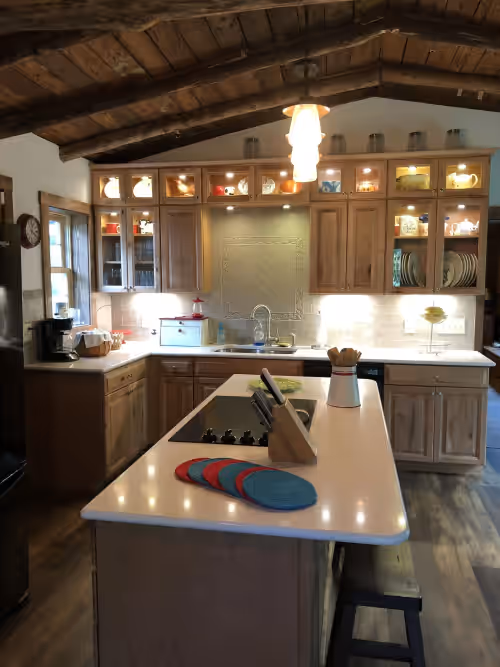 Fully stocked kitchen with cookware, plates/bowls, flatware, glassware, etc. at Plan your vacation to Patten's Landing, our