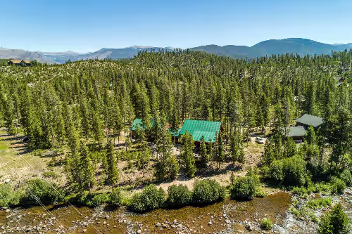 Riverfront log home on 3 acres near RMNP w/hot tub, private beach & flyfishing, photo 2