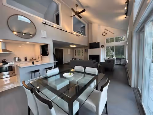 Dining at Renovated North Fork Waterfront Home with Pool