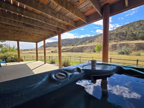 Outdoor spa tub at Sky Creek Ranch Montana