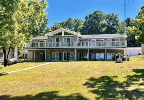 Spacious Lake house with Double Boat Dock & Gently Sloping Lot