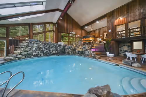 Events Welcome! Exclusive 65-Acre Gated Estate w/ Indoor Pool & Private Lake