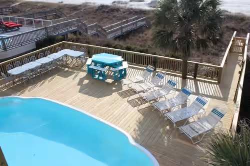 PLENTY OF ROOM TO SUN AND DINE ON THE DECK OVERLOOKING THE OCEAN at OCEANFRONT W/POOL 8 Bedroom 8 Bath OCEANFRONT Located