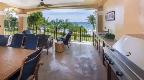 BBQ Area at Stunning beachfront Flamingo mansion with incomparable ocean setting