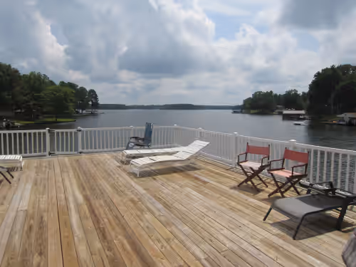 Upper double boat house deck overlooking main lake at 7500 Sq Ft home with 3 floors- Saturday to Saturday summer rental