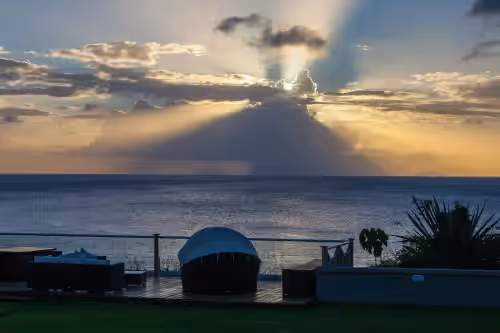 Beautiful Sunset from the upper deck at Newly Remodeled Oceanfront Villa